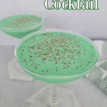 grasshopper cocktail printed over a martini glass filled with green cocktail and garnished with chocolate shavings