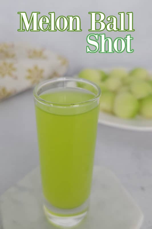 Melon Ball Shot text over a bright green cocktail shot