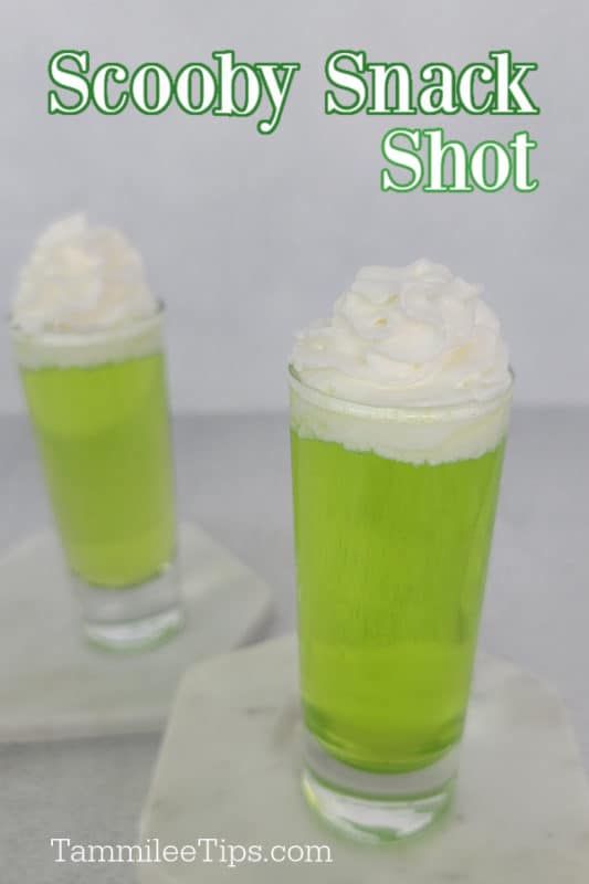 Scooby Snack Shot text over two green cocktail shots with whipped cream garnish