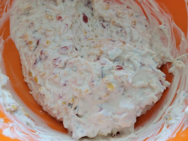 Creamy dip mixture in an orange bowl