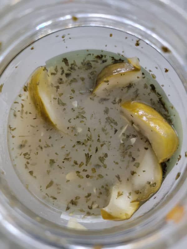 pickle spears in a jar with ranch dressing