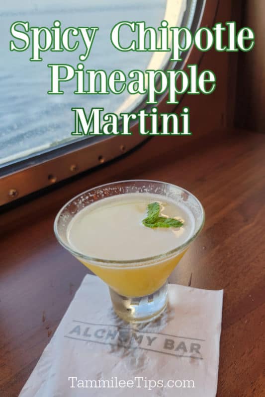 Spicy Chipotle Pineapple Martini over a martini glass with a view of the ocean
