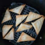 air fried spanakopita in the air fryer basket