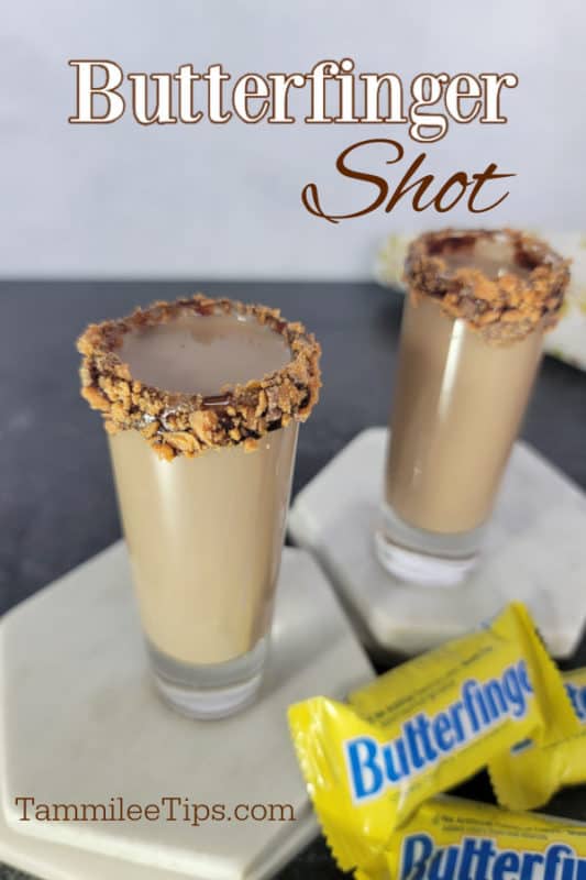 Butterfinger Shot text over two shots with chocolate rimmed glass sitting on coasters with Butterfinger candy