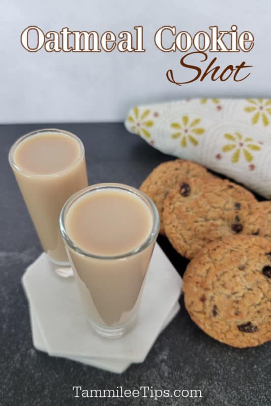 Oatmeal cookie shot text over two filled shot glasses next to oatmeal cookies