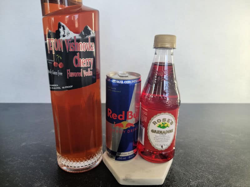 Cherry vodka, Red Bull and Grenadine bottles 