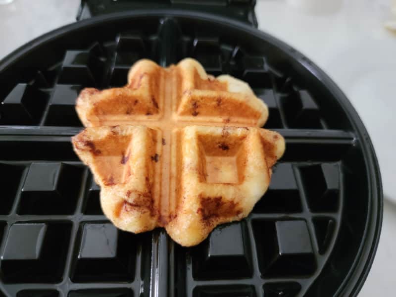 cinnamon roll baked on a waffle maker