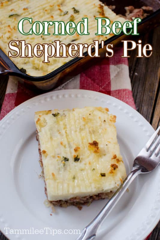 Corned Beef Shepherds Pie over a white plate with a slice of shepherd's pie and a fork