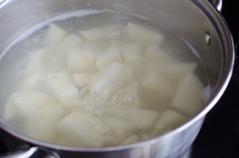 Potatoes boiling in a stock pot