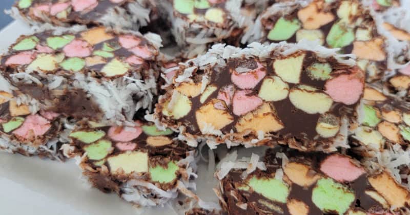 slices of no bake church window cookies on a white platter