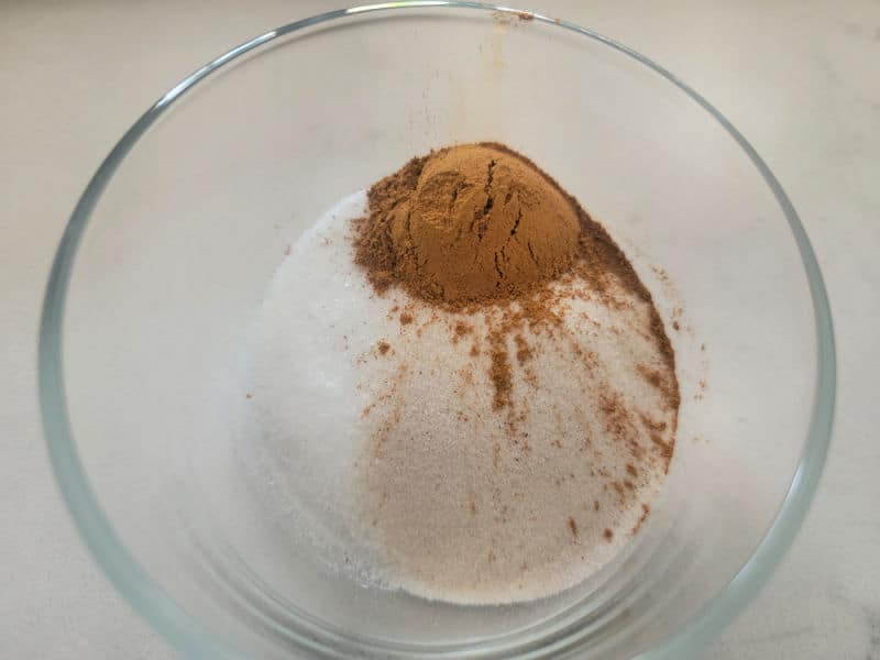Cinnamon and sugar in a glass bowl