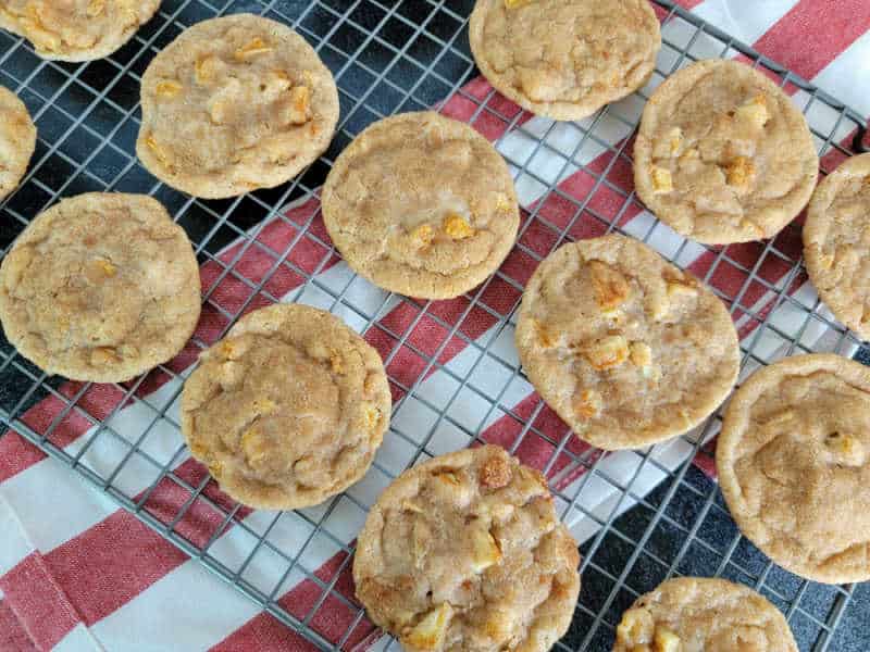 Apple Cider Cookies on a wire rack over a red striped cloth napkin