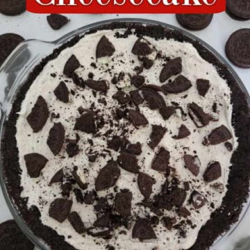 No Bake Oreo Cheesecake text over a oreo cheesecake surrounded by oreo crumbs