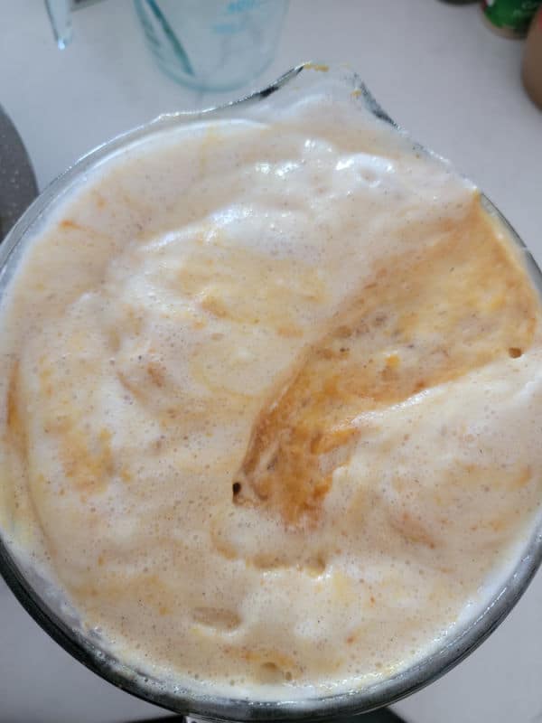 Angel food cake mix in a glass mixing bowl