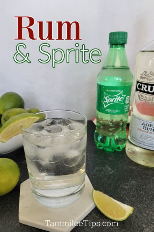 Rum and Sprite over a cocktail glass on a white coaster, bowl of limes, and a bottle of Sprite and Aged Rum