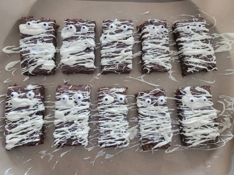 Mummy Brownies on parchment paper