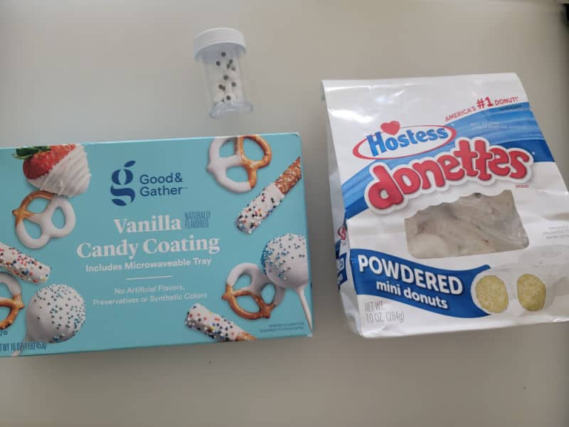 Vanilla candy coating, candy eyes, Hostess Donettes mini donuts