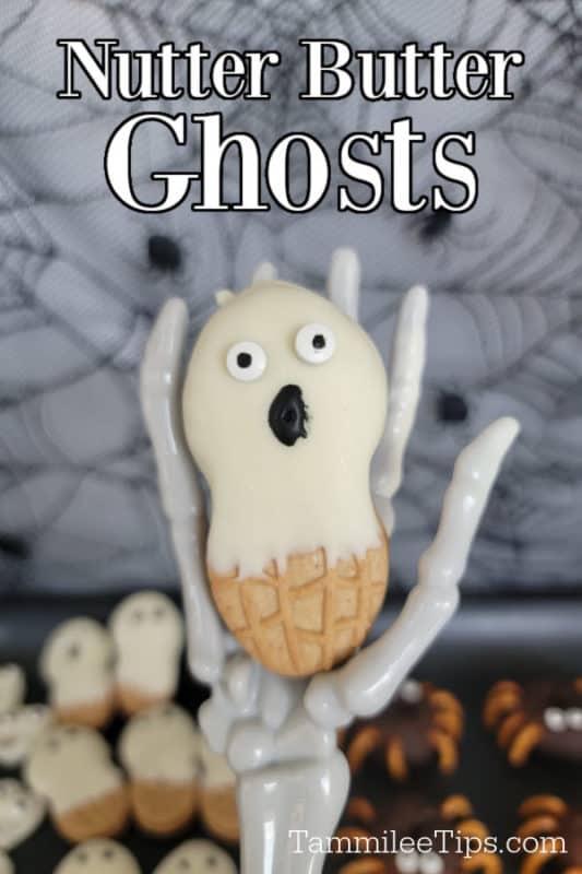 Nutter Butter Ghosts text over a skeleton hand holding a ghost cookie