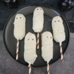 Twinkie Mummies on a black circle plate