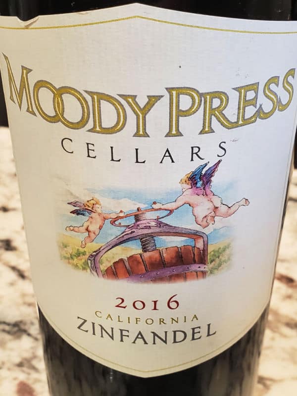 Moody Press Cellars wine label with 2 angels on it. 2016 California Zinfandel