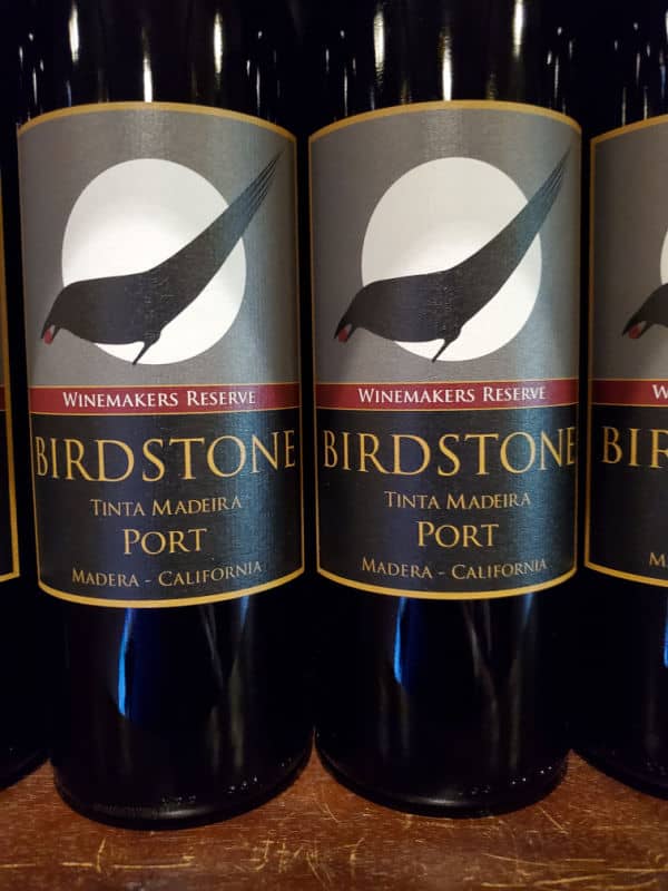 Birdstone Tinta Madeira Port Bottle with a black bird on the cover of the wine bottle