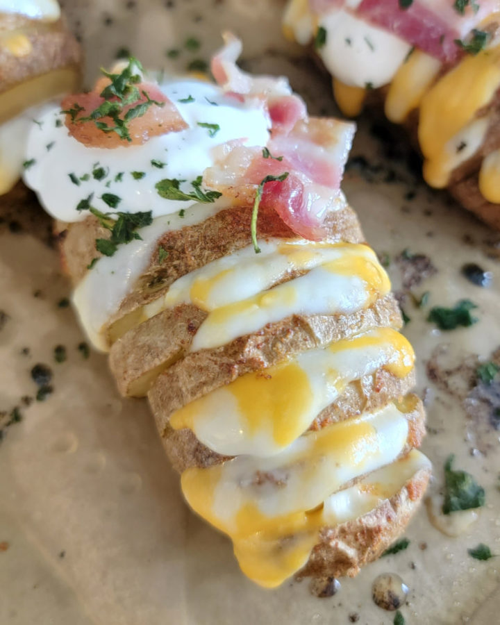 Hasselback Potato on parchment paper