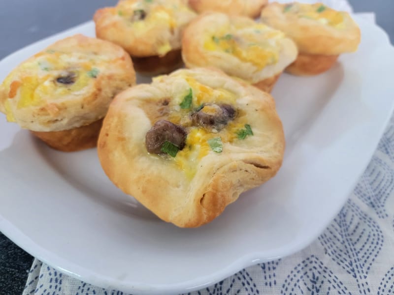 platter of cheesy egg sausage biscuit cups