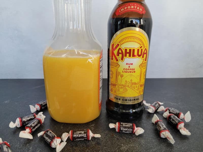Tootsie Roll Shot ingredients orange juice, kahlua coffee liqueur and mini tootsie rolls