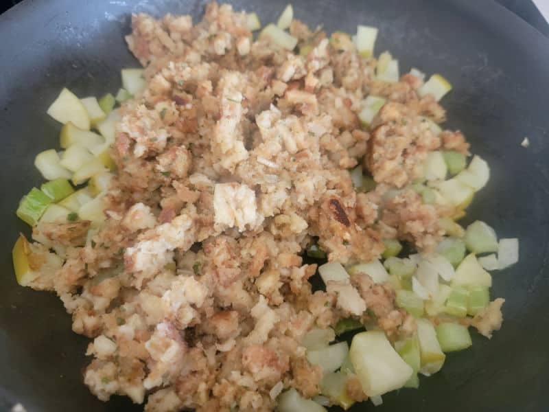 Apple stuffing in a skillet before mixing together. 