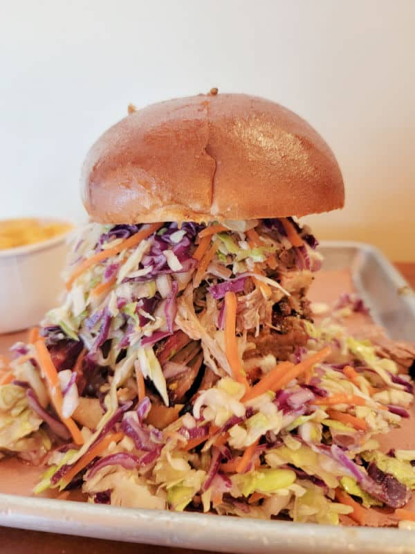 Pitmaster Sandwich with coleslaw on a silver trail from Smokehouse 41 Barbecue restaurant, Oakhurst, CA
