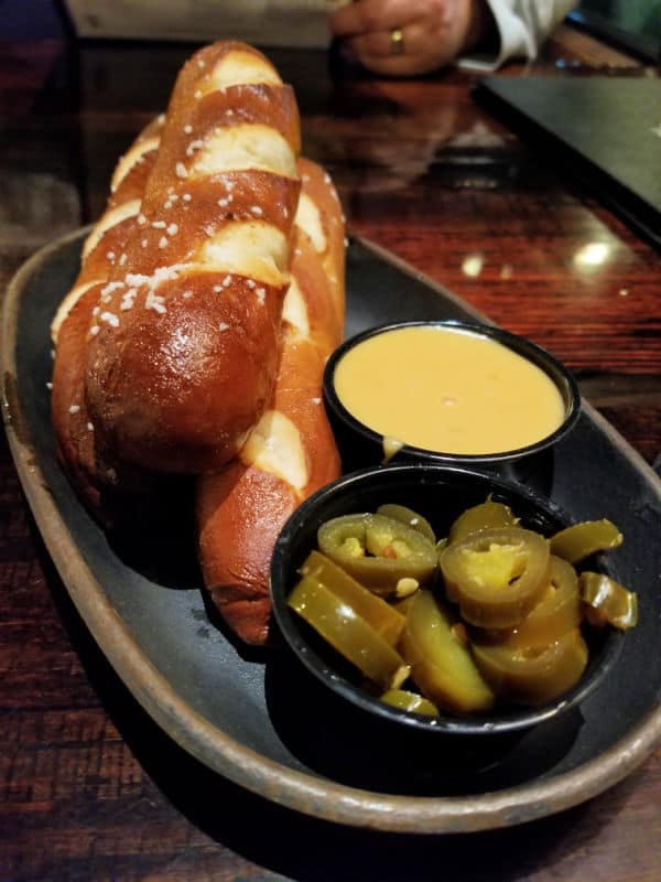 Pretzels and cheese sauce at South Gate Brewing Company