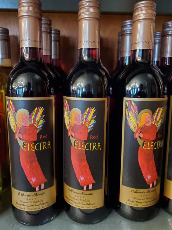 Red Electra California Moscato bottle with a red angel on it at Quady Winery