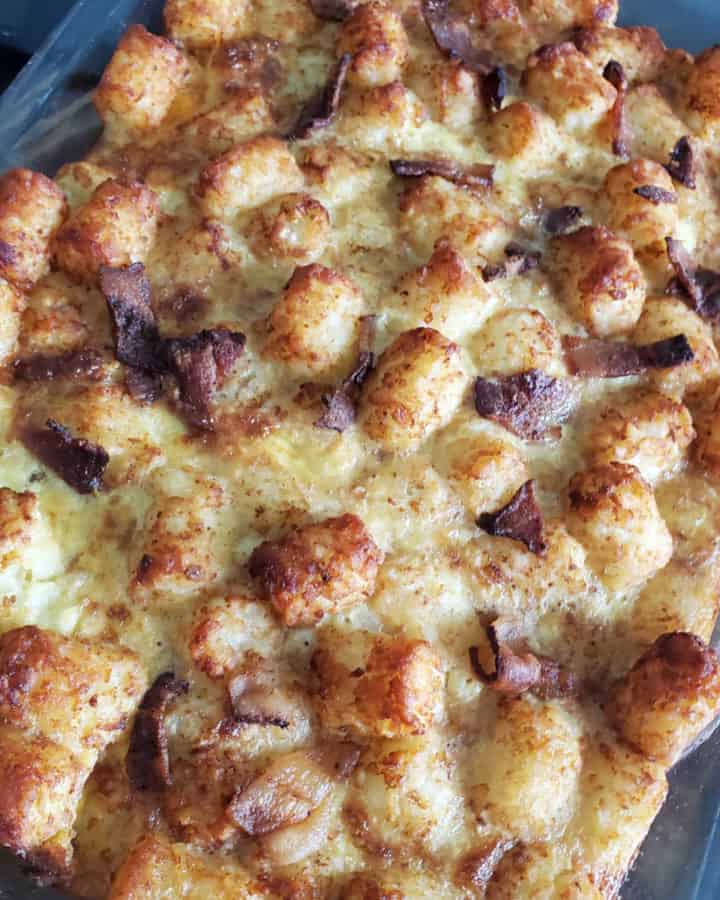 tater tot breakfast casserole in a glass baking dish