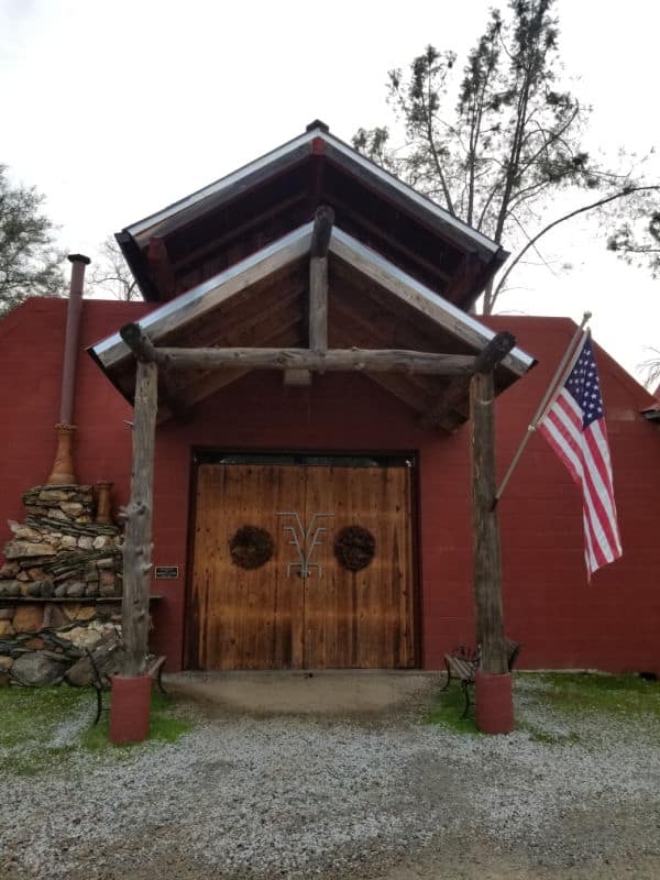 Outdoor entrance to Westbrook Wines cellar with an American Flag