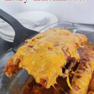 Black spatula scooping lazy enchiladas out of a glass casserole dish