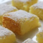 2 Ingredient Lemon Bars with powdered sugar garnish