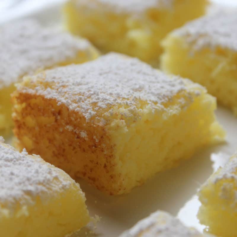 2 Ingredient Lemon Bars with powdered sugar garnish