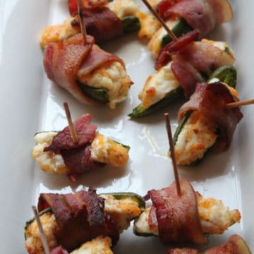 Bacon-Wrapped Jalapeños on a white platter