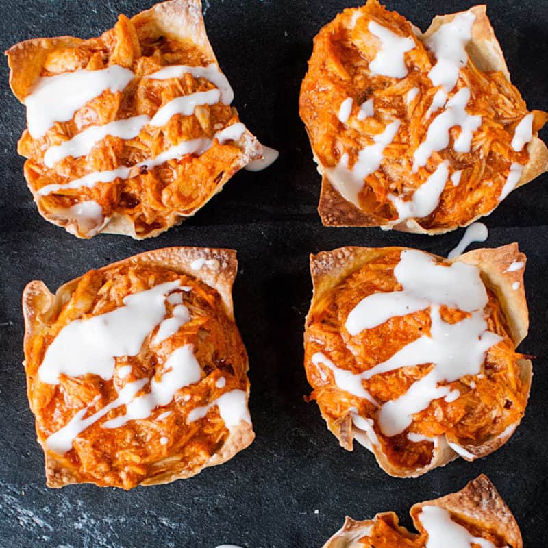 Buffalo Chicken Wontons on a slate platter