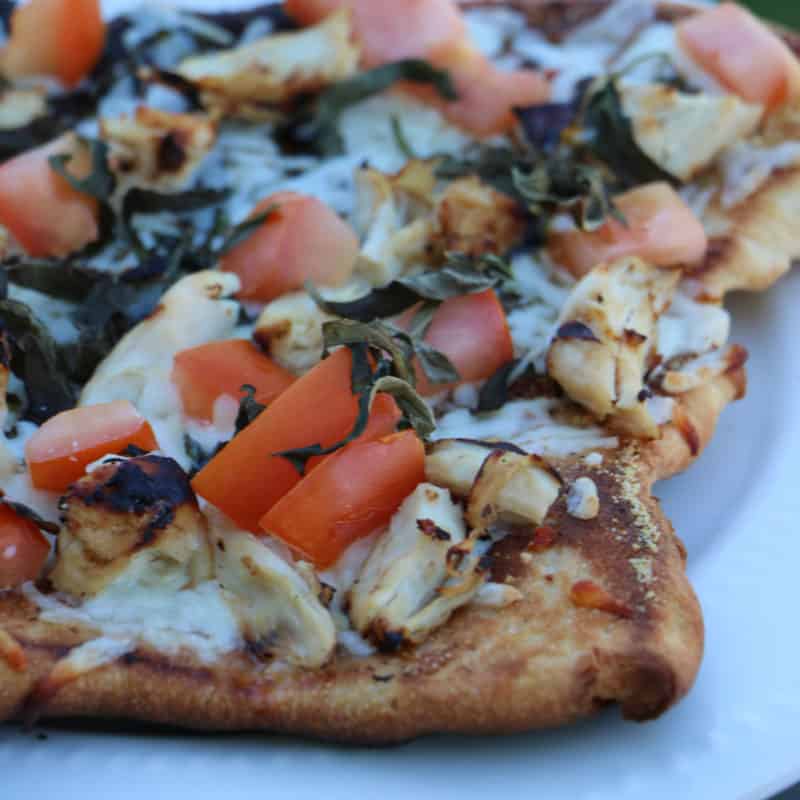 Chicken Bruschetta Pizza on a white plate