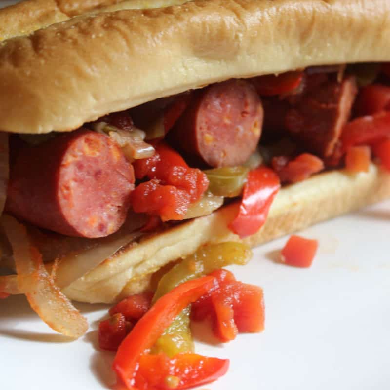 Crock Pot Cajun Smoked Sausage Po’Boy on a white plate