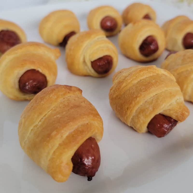 Pigs in a Blanket on a white plate