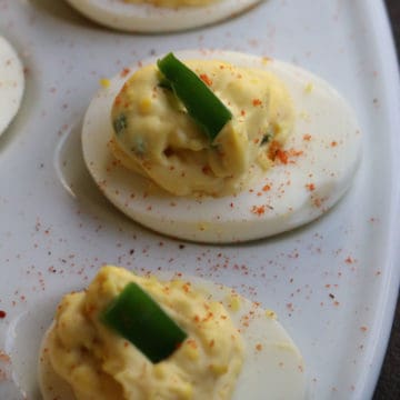 Spicy devilled eggs on an egg platter