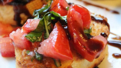 Tomato bruschetta on a baguette slice