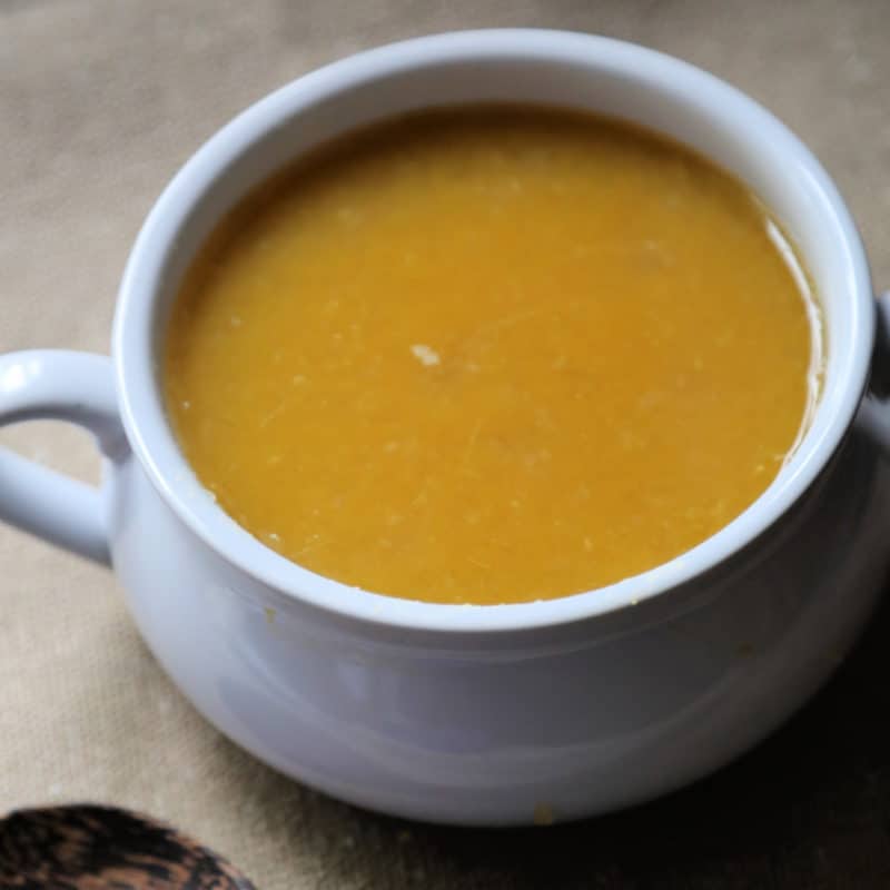 Crock Pot Butternut Apple Soup in a white bowl with handles