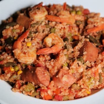 Crock Pot Kielbasa and Shrimp Stew in a white bowl