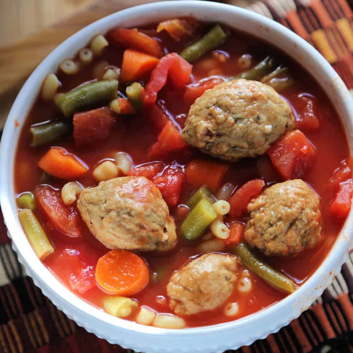 Crock Pot Vegetarian Meatball Soup in a white bowl