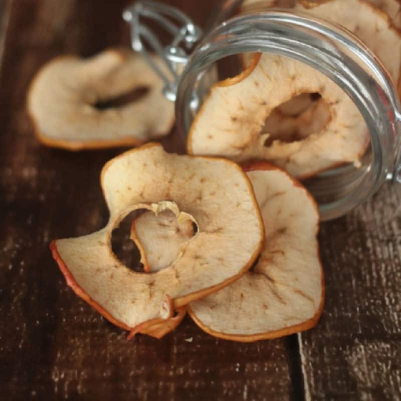 Dried apple rings on a wood board