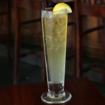 Lynchburg Lemonade in a tall glass with a lemon wheel