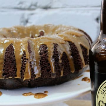 Guinness Chocoalte Cake with caramel icing on a white platter